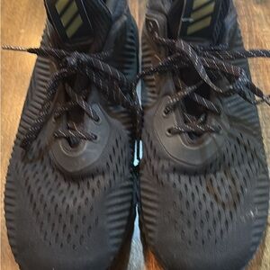 adidas Black Athletic Shoes with Yellow Highlights